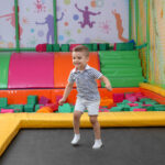 young boy at trampoline park